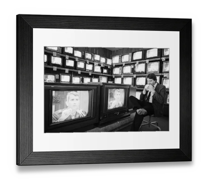 Framed Print : Salesman Eats, Watches Oliver North On Tv Framed Print : Salesman Eats, Watches Oliver North On Tv