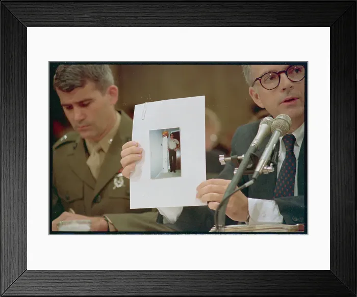 Framed Print : Attorney Holding Photo in Court Framed Print : Attorney Holding Photo in Court