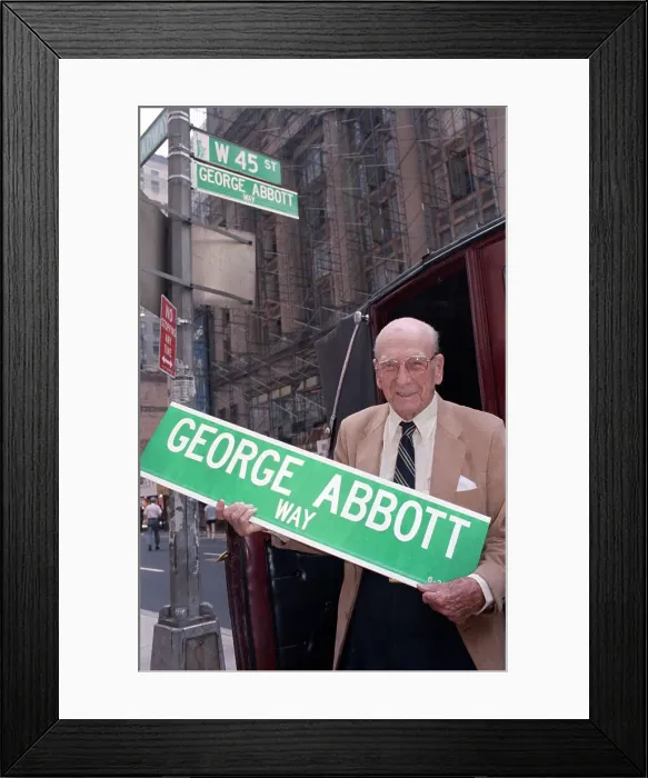 Framed Print : Playwright George Abbott with Manhattan Street Sign Framed Print : Playwright George Abbott with Manhattan Street Sign