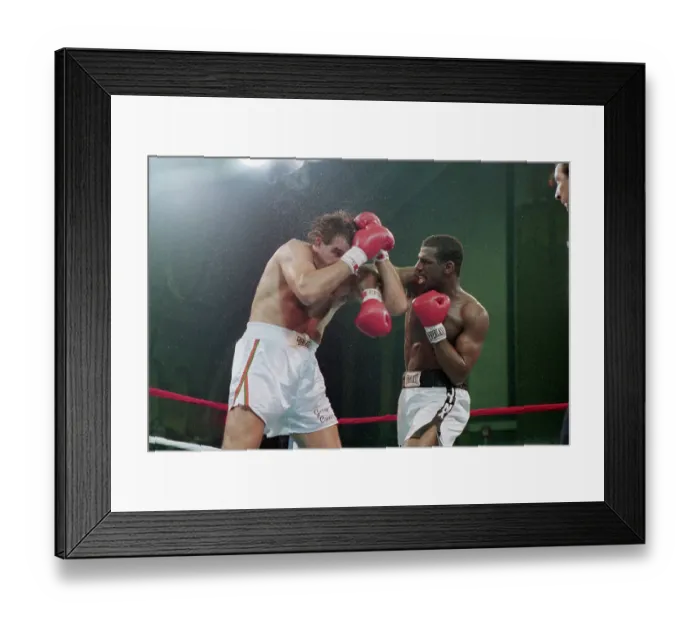 Framed Print : Michael Spinks Punches Cowering Jerry Cooney Framed Print : Michael Spinks Punches Cowering Jerry Cooney