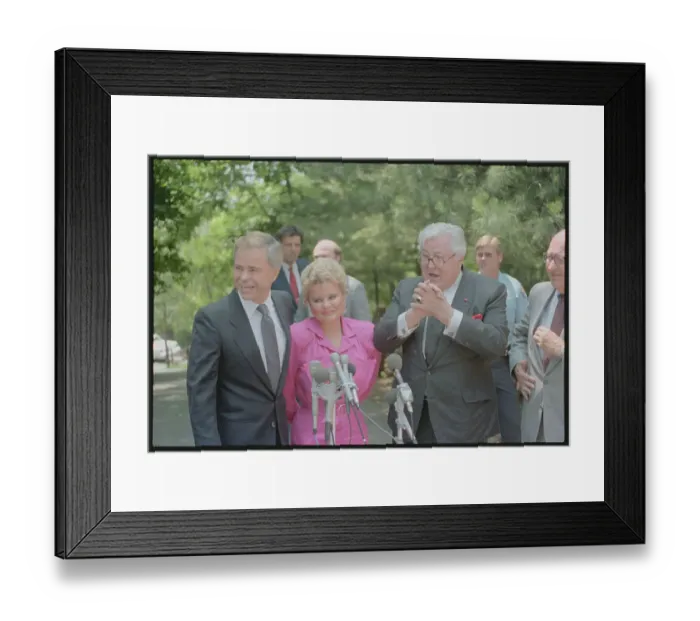 Framed Print : Jim Bakker Exiting Car with Bible and Flowers Framed Print : Jim Bakker Exiting Car with Bible and Flowers