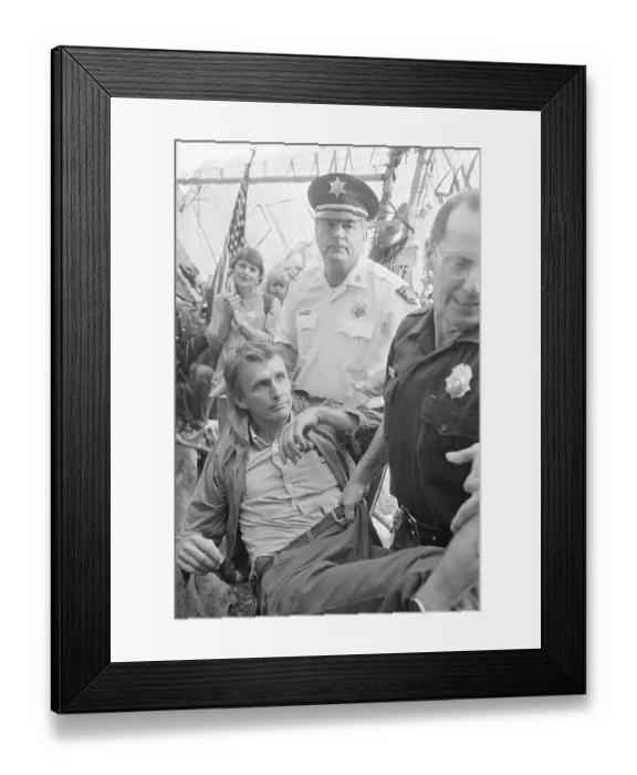 Framed Print : Police Carrying Protester By Pants Framed Print : Police Carrying Protester By Pants