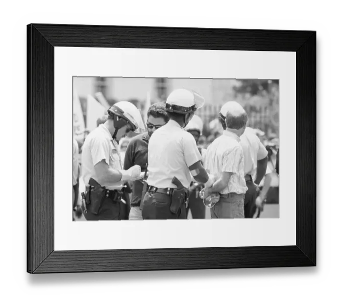 Framed Print : Police Handcuffing a Protester Framed Print : Police Handcuffing a Protester