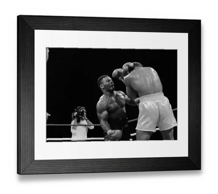 Framed Print : Mike Tyson Punches Pinklon Thomas Framed Print : Mike Tyson Punches Pinklon Thomas