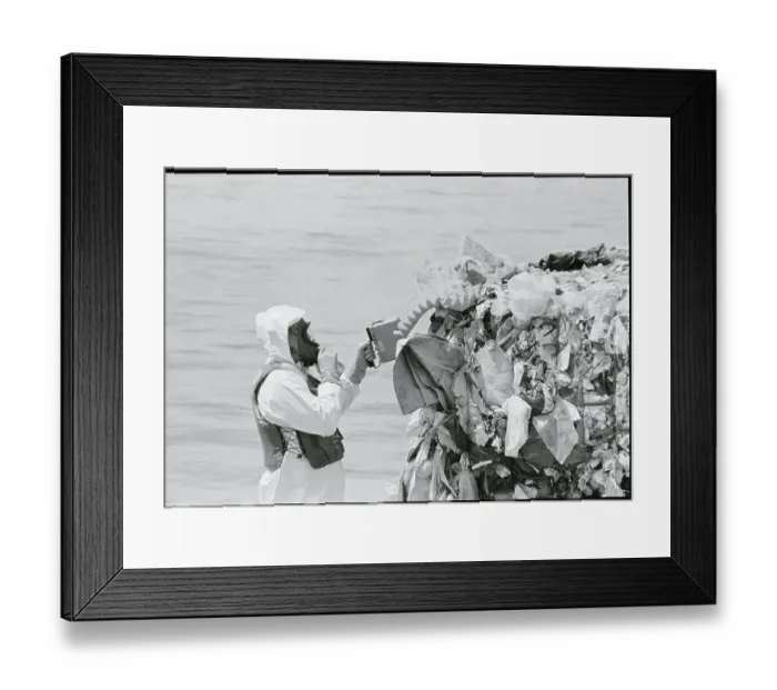 Framed Print : Task Force Member Inspecting Pile of Garbage on Barge Framed Print : Task Force Member Inspecting Pile of Garbage on Barge