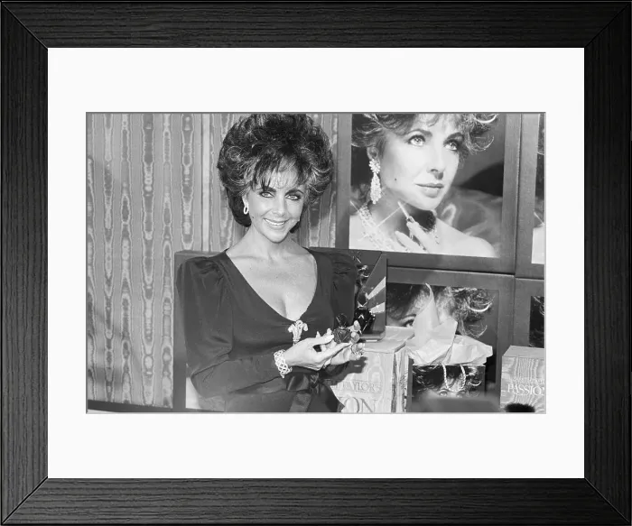 Framed Print : Elizabeth Taylor With Perfume Framed Print : Elizabeth Taylor With Perfume