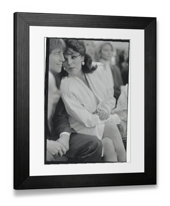 Framed Print : Actress Joan Collins Chatting with Escort Framed Print : Actress Joan Collins Chatting with Escort