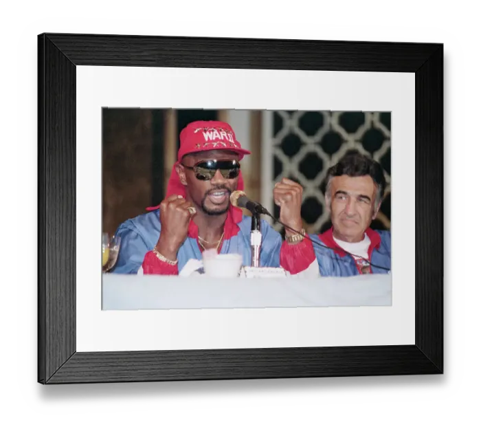 Framed Print : Marvin Hagler Holds Up Fists at Microphone Framed Print : Marvin Hagler Holds Up Fists at Microphone