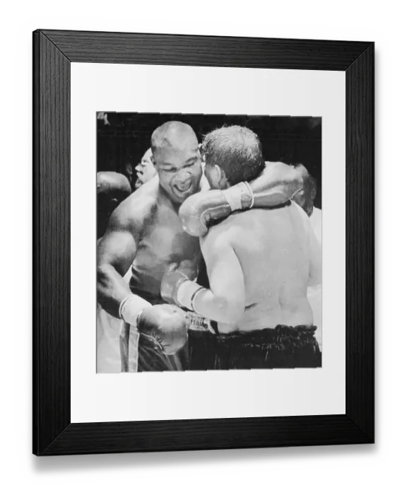 Framed Print : George Foreman Hugging Opponent