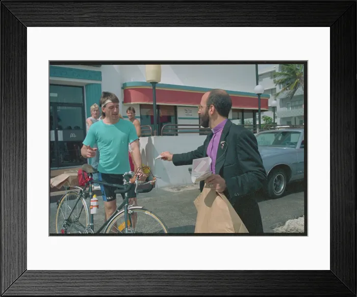 Framed Print : Reverend Passing Out Condoms Framed Print : Reverend Passing Out Condoms