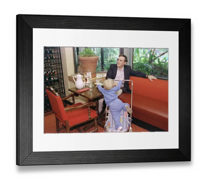 Framed Print : Rudolph Giuliani Baby Sitting Son at Home Framed Print : Rudolph Giuliani Baby Sitting Son at Home