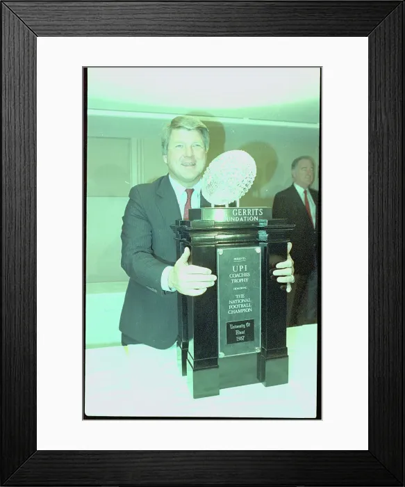Framed Print : Jimmy Johnson Posing with Award Framed Print : Jimmy Johnson Posing with Award