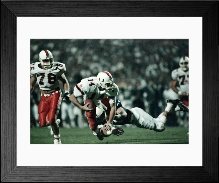 Framed Print : Vinnie Testaverde and Shane Conlan in Football Action
