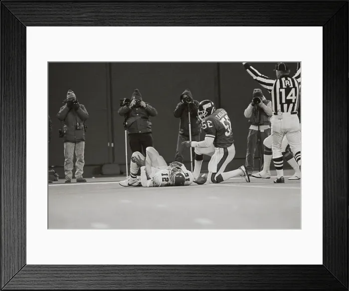 Framed Print : Randall Cunningham on Turf After Being Stopped by Lawrence Taylor Framed Print : Randall Cunningham on Turf After Being Stopped by Lawrence Taylor