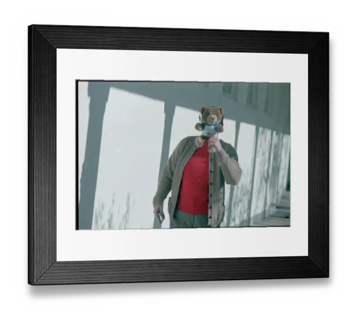 Framed Print : Ronald Reagan Covering Face with Teddy Bear Framed Print : Ronald Reagan Covering Face with Teddy Bear