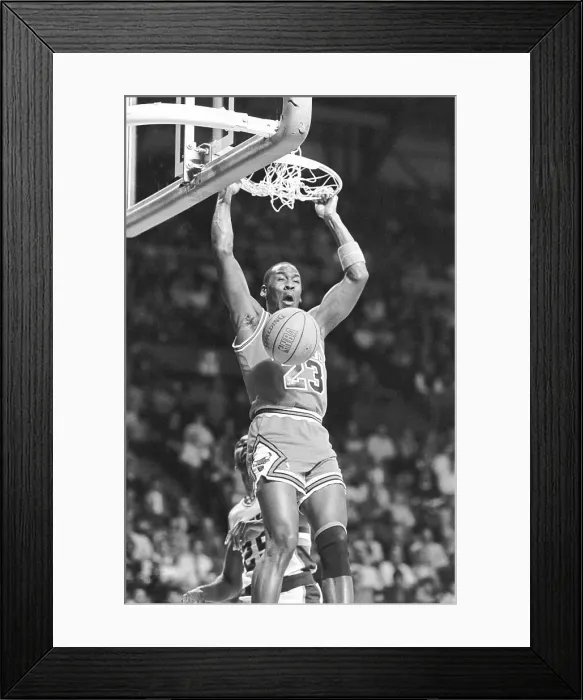 Framed Print : Michael Jordan Hanging on Rim After Slam Dunk Framed Print : Michael Jordan Hanging on Rim After Slam Dunk