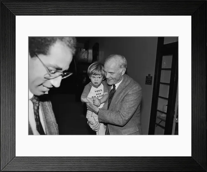 Framed Print : John Glenn Holding His Grandson Framed Print : John Glenn Holding His Grandson