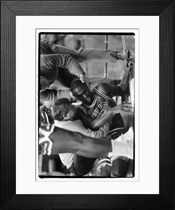 Framed Print : An Injured Michael Jordan is Looked After by Officials Framed Print : An Injured Michael Jordan is Looked After by Officials
