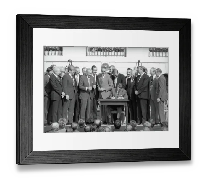 Framed Print : Ronald Reagan Signing Document with Onlookers Framed Print : Ronald Reagan Signing Document with Onlookers