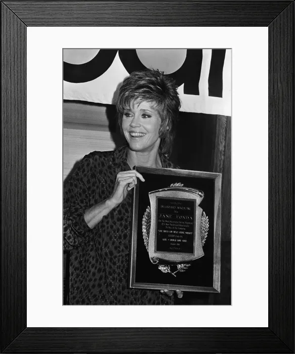 Framed Print : Jane Fonda Holds Plaque Framed Print : Jane Fonda Holds Plaque