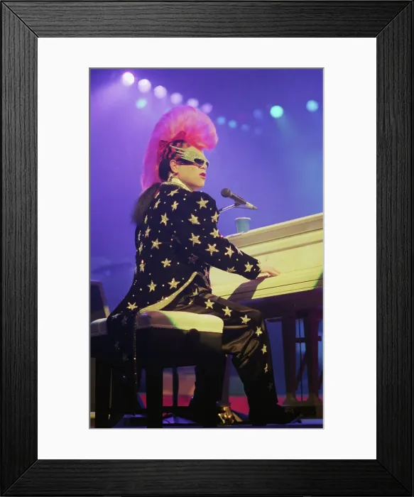 Framed Print : Elton John Performs with Mohawk Hairdo Framed Print : Elton John Performs with Mohawk Hairdo