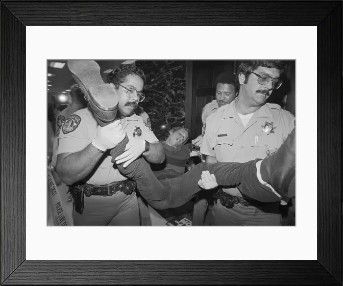 Framed Print : State Police Carrying Demonstrator Framed Print : State Police Carrying Demonstrator