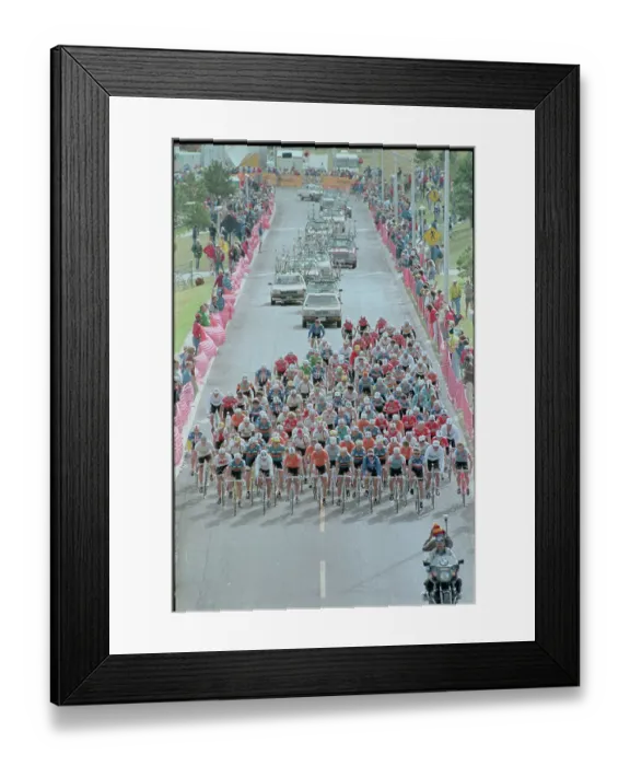 Framed Print : Bicycle Racing Event with Motorcade Framed Print : Bicycle Racing Event with Motorcade