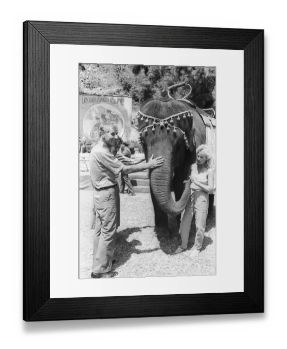 Framed Print : Gov. George Deukmejian and Tarra the Elephant