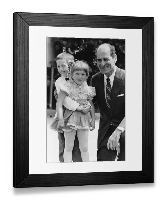 Framed Print : Child Demonstrating Heimlich Maneuver to its Inventor Framed Print : Child Demonstrating Heimlich Maneuver to its Inventor