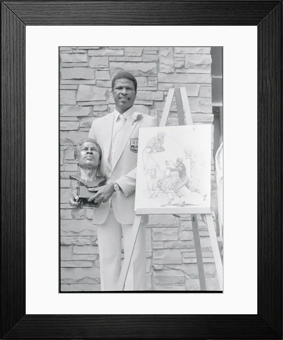 Framed Print : Ken Houston Holding a Bust Framed Print : Ken Houston Holding a Bust