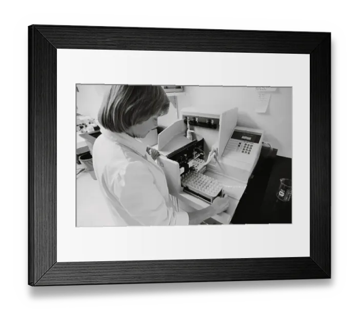 Framed Print : Woman Testing Blood for AIDS Antibodies