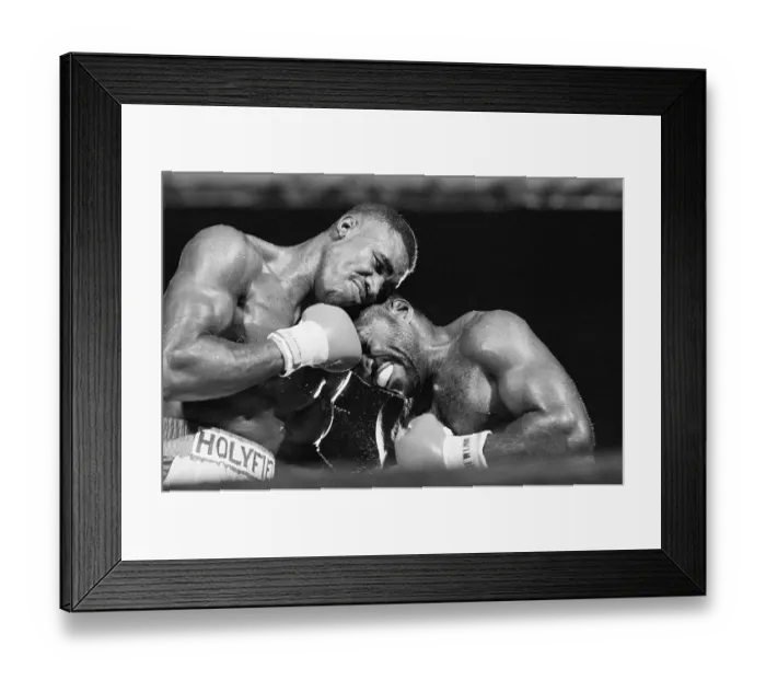 Framed Print : Evander Holyfield Punches Qawis in Forehead Framed Print : Evander Holyfield Punches Qawis in Forehead