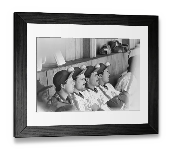 Framed Print : Mets Players Sitting with Baseballs on Their Caps Framed Print : Mets Players Sitting with Baseballs on Their Caps
