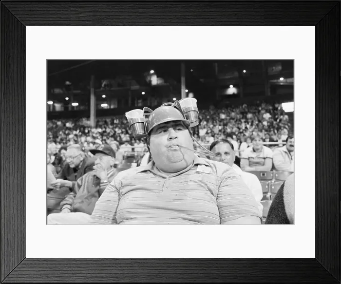 Framed Print : Baseball Fan Drinking From Beer Hat Framed Print : Baseball Fan Drinking From Beer Hat