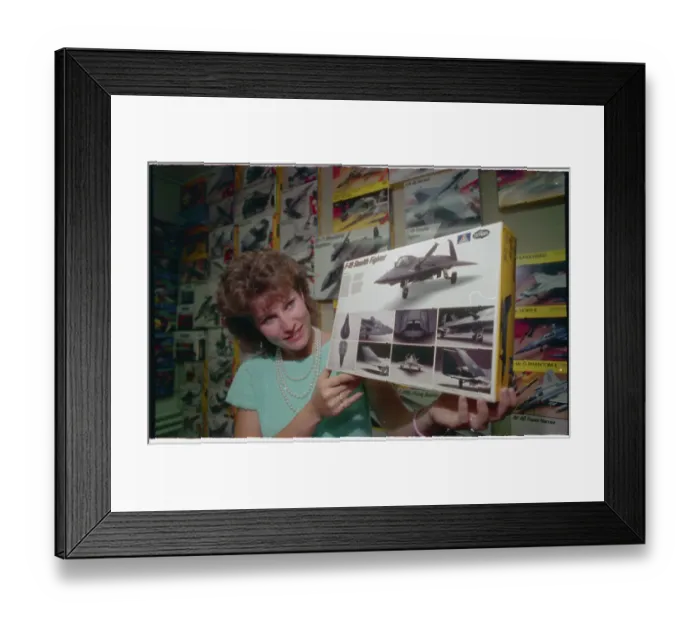 Framed Print : Woman Displaying Drawing of Super Secret Stealth Fighter Framed Print : Woman Displaying Drawing of Super Secret Stealth Fighter