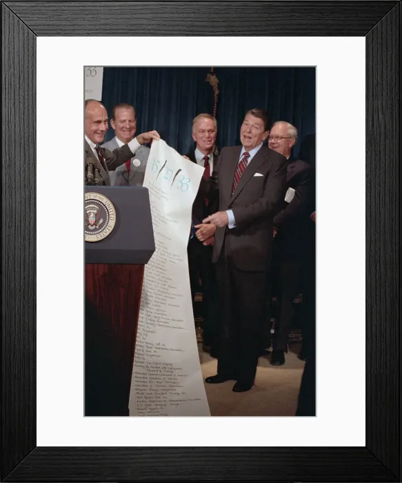Framed Print : John Richman with Lengthy Scroll on Tax Reform Framed Print : John Richman with Lengthy Scroll on Tax Reform