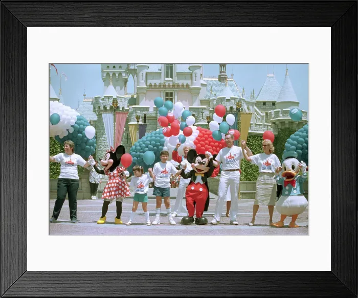 Framed Print : Frank G. Wells Posing with Disney Characters
