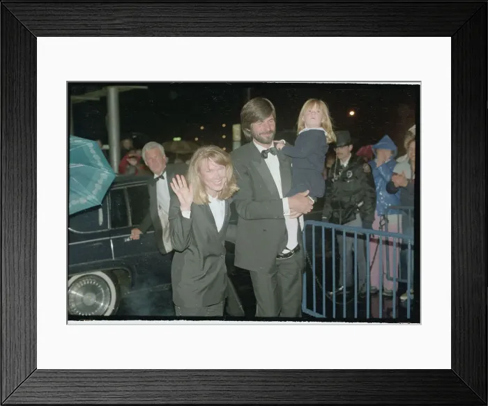 Framed Print : Sissy Spacek Waving with Her Husband and Daughter Framed Print : Sissy Spacek Waving with Her Husband and Daughter