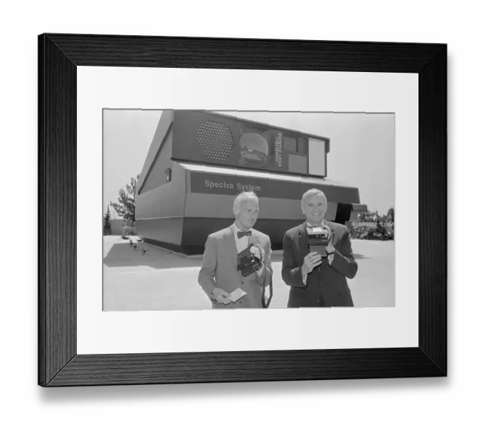 Framed Print : William McCune and MacAllister Booth Holding Camera