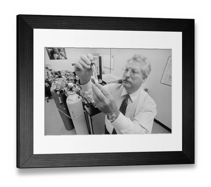 Framed Print : Dr. John Laseter Examining Test Tube Framed Print : Dr. John Laseter Examining Test Tube