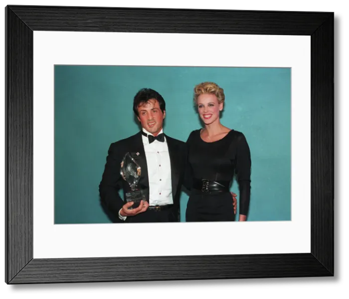 Framed Print : Sylvester Stallone with Brigitte Nielsen Framed Print : Sylvester Stallone with Brigitte Nielsen