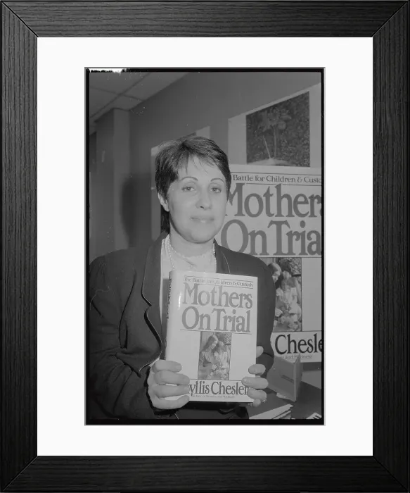 Framed Print : Phyllis Chesler Holding Her Book Framed Print : Phyllis Chesler Holding Her Book