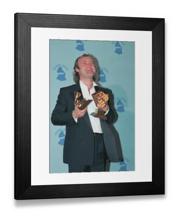 Framed Print : Phil Collins Showing Off Grammy Awards Framed Print : Phil Collins Showing Off Grammy Awards