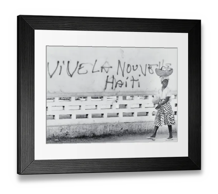 Framed Print : Woman Walking Past Graffiti Framed Print : Woman Walking Past Graffiti