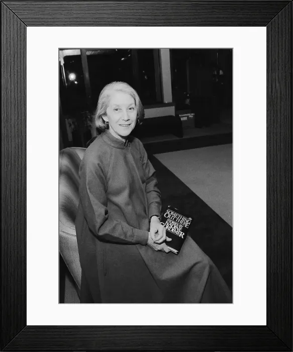 Framed Print : Author Nadine Gordimer Holding Her Book Something Out There Framed Print : Author Nadine Gordimer Holding Her Book Something Out There