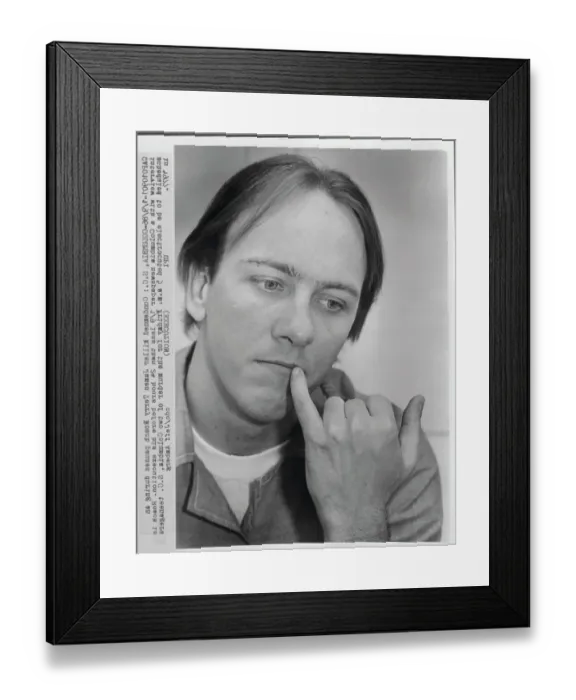 Framed Print : James Terry Roach with His Finger Resting on His Face Framed Print : James Terry Roach with His Finger Resting on His Face