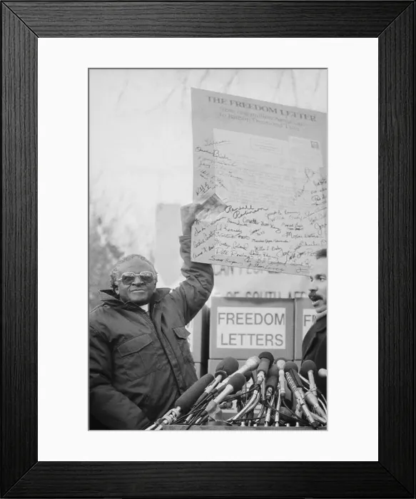 Framed Print : Desmond Tutu Holds Up Freedom Letter Framed Print : Desmond Tutu Holds Up Freedom Letter