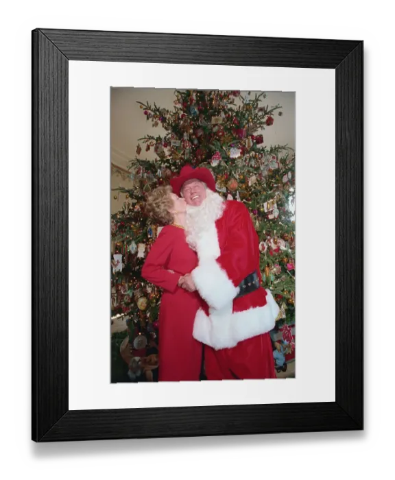 Framed Print : Nancy Reagan Embracing Actor Larry Hagman