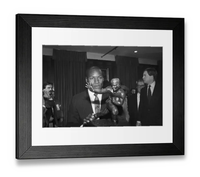 Framed Print : Bo Jackson Holding Heisman Trophy