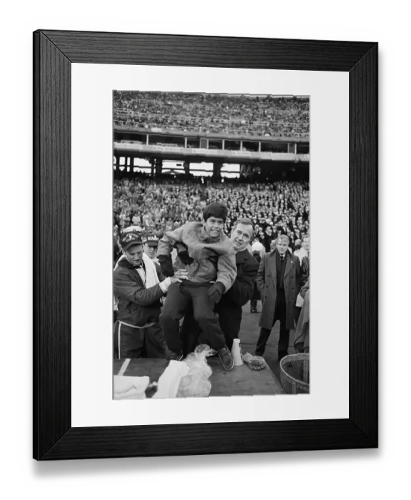 Framed Print : George Bush Lifting His Grandson Framed Print : George Bush Lifting His Grandson